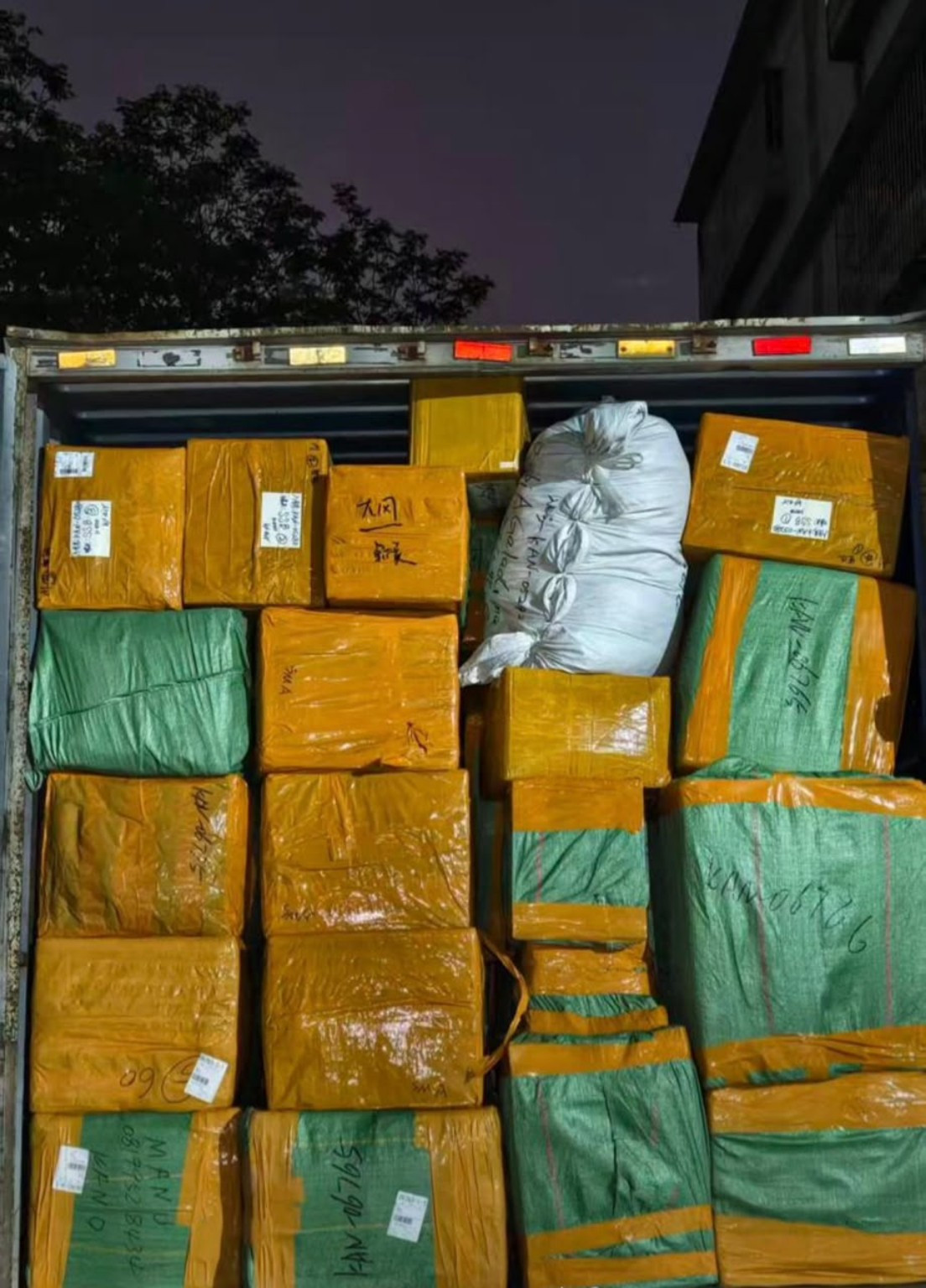 Wrapped parcels packed into a delivery vehicle